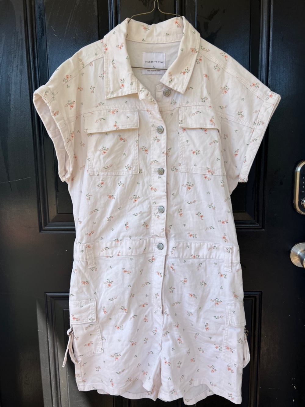 Celebrity Pink Light Cream Floral Utility Romper